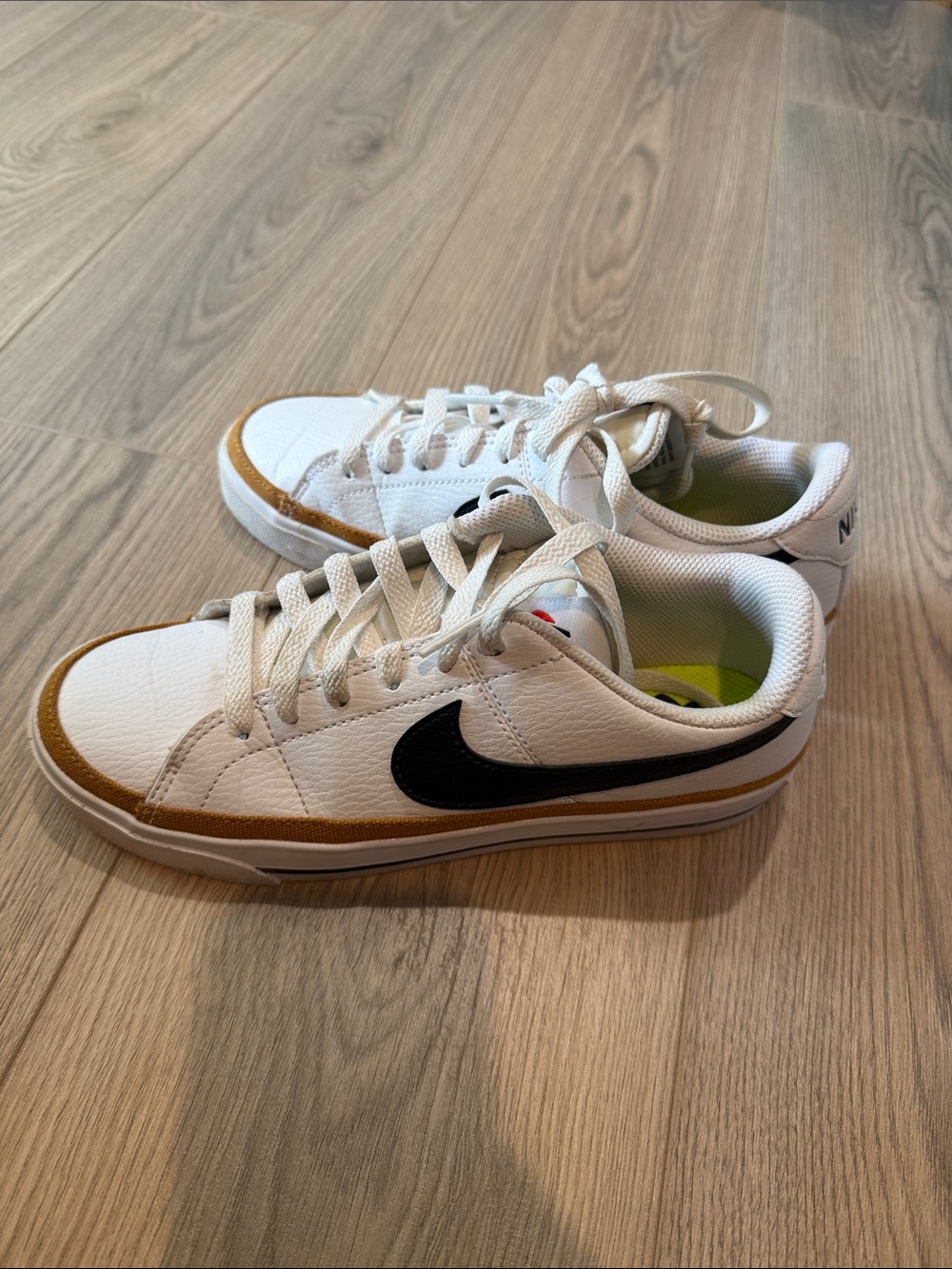Nike White Sneakers with Black Swoosh and Brown Trim